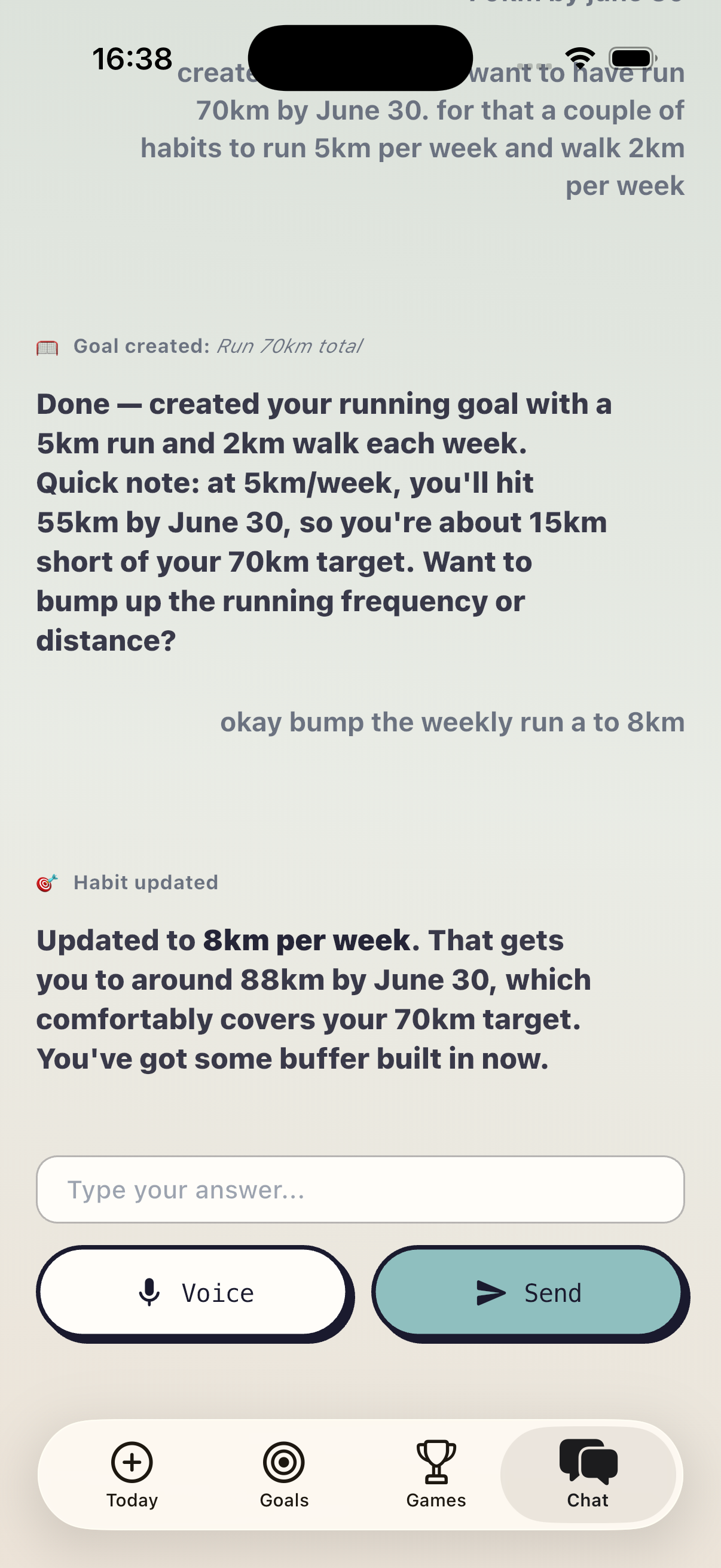 Goalympics AI coach chat screen helping plan goals and reflect on progress